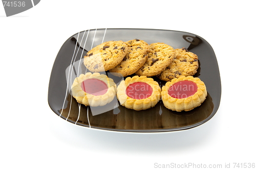 Image of cookies on plate isolated on white backgrounds