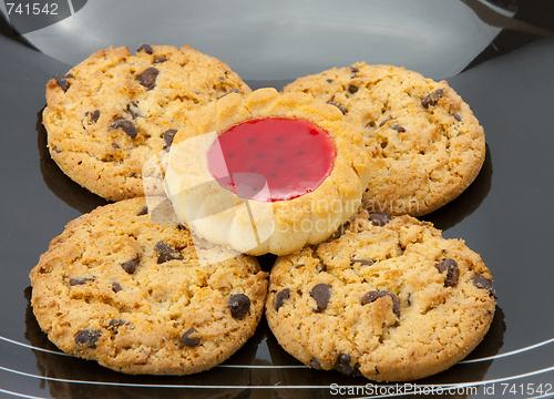 Image of cookies on plate isolated on white backgrounds