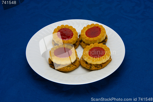 Image of cookies on a Plate on a blue background