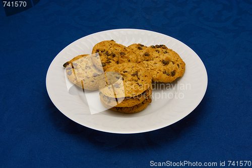 Image of cookies on a Plate on a blue background