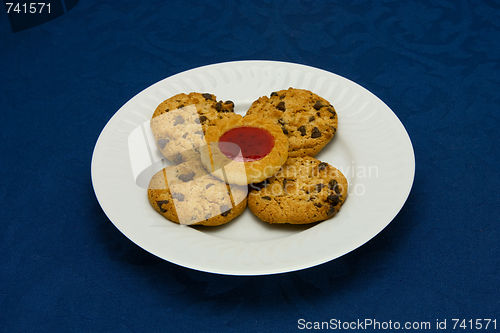 Image of cookies on a Plate on a blue background