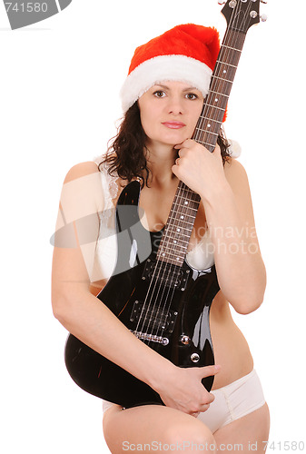 Image of santa claus with guitar