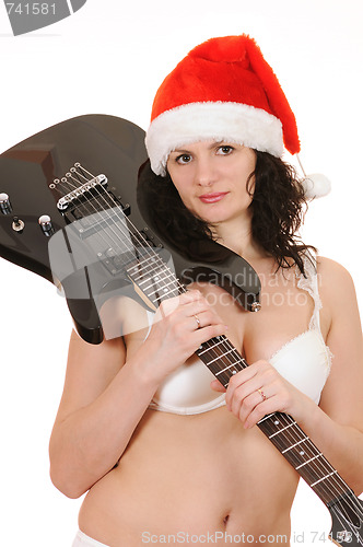 Image of santa claus with guitar