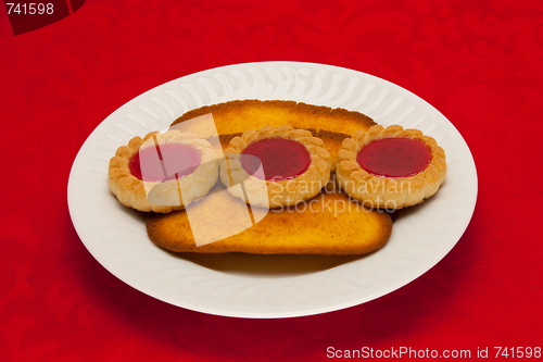 Image of plate of cookies on red background