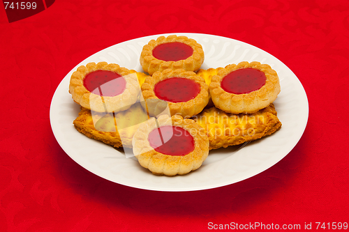 Image of plate of cookies on red background