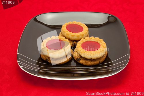 Image of plate of cookies on red background