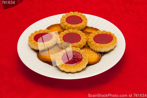 Image of plate of cookies on red background