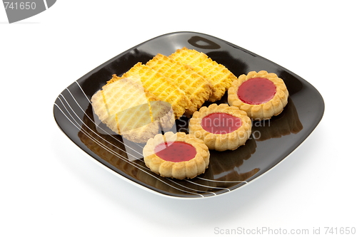 Image of cookies on plate isolated on white backgrounds