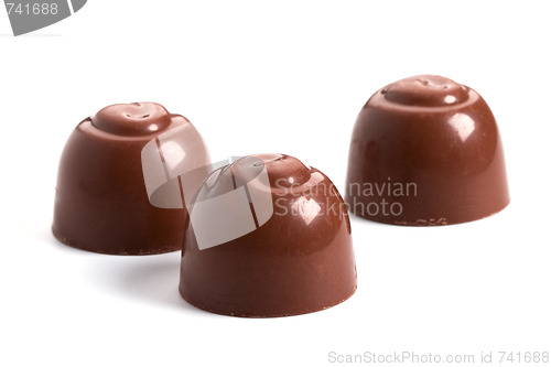 Image of three chocolate sweets 