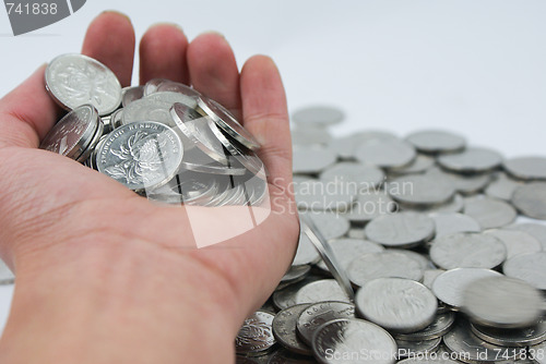 Image of Holding coin