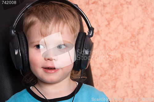 Image of child in ear-phones