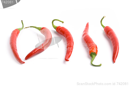 Image of five red chilly peppers