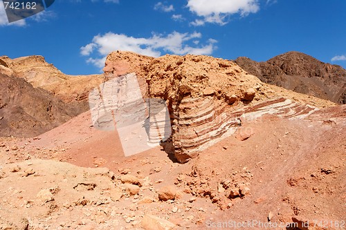 Image of Scenic striped rocks in stone desert