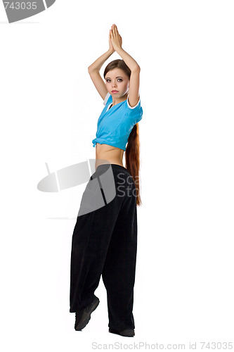 Image of Young woman exercising