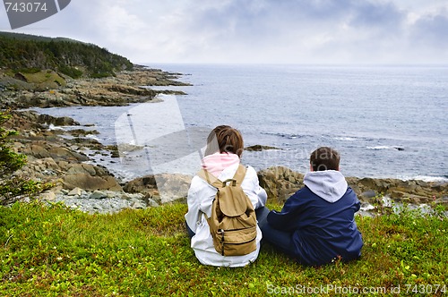 Image of Children sitting at Atlantic coast in Newfoundland