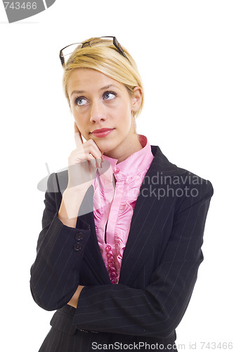 Image of Young businesswoman thinking
