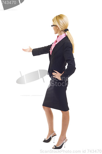 Image of businesswoman welcoming or presenting