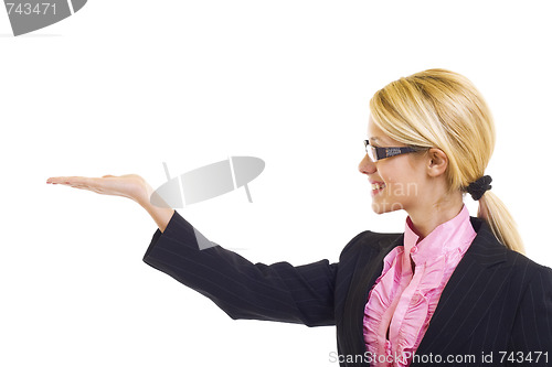 Image of attractive businesswoman presenting something