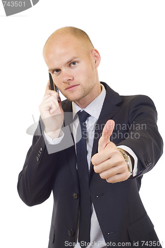 Image of businessman on the phone and thumbs up