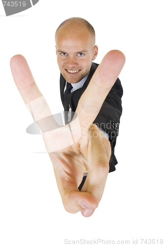 Image of Businessman showing Victory sign