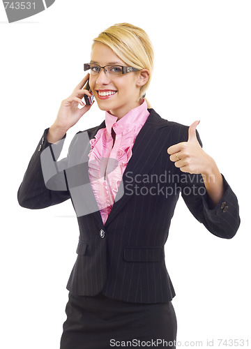 Image of businesswoman on the phone making her ok sign