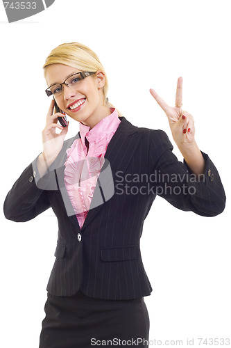 Image of woman with phone and victory gesture