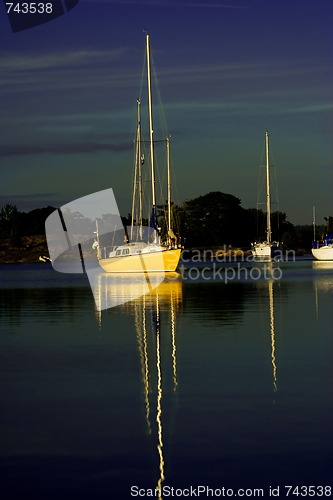 Image of anchored sailboat