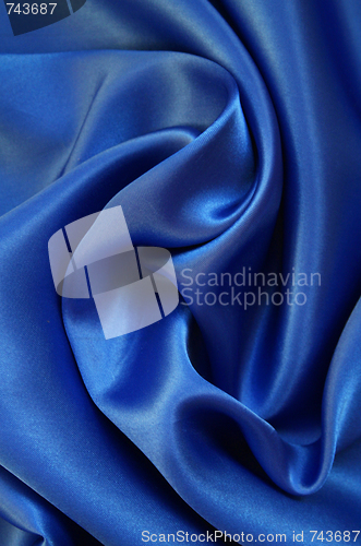 Image of Smooth elegant blue silk as background 