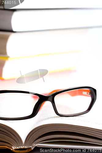 Image of books and glasses