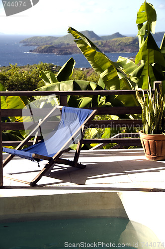 Image of caribbean island villa pool with lovely view of grenadine island