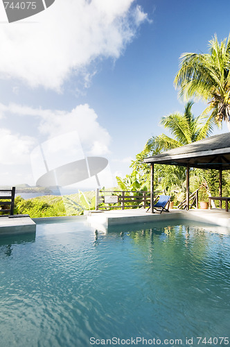 Image of caribbean island villa pool with lovely view of grenadine island