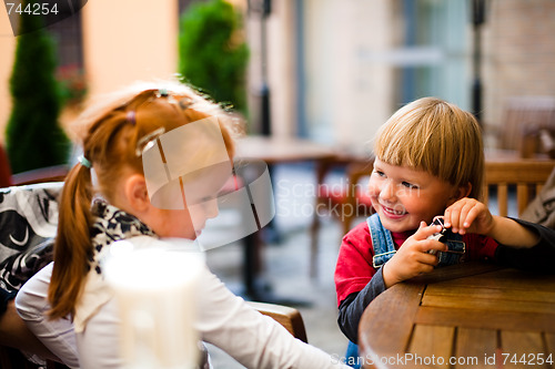 Image of Little boy  playing and smiling