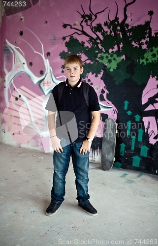 Image of Young boy with shoulder bag