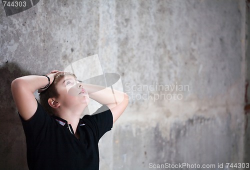 Image of Young boy looking up with hope in his eyes