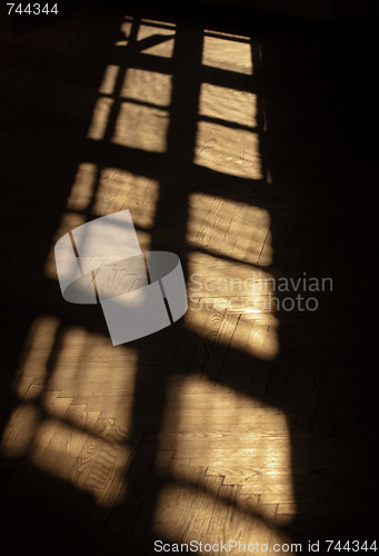 Image of Sunlight dropping on the wooden floor 