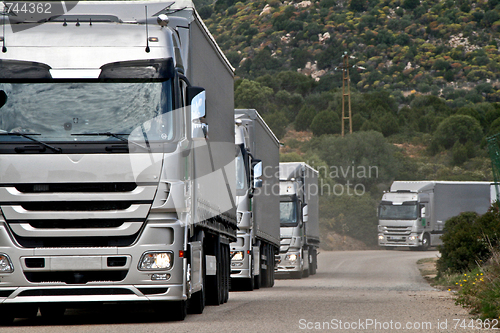 Image of Silver trucks convoy