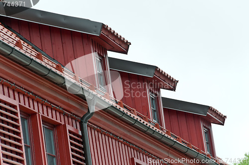 Image of Mansard with windows and tilled roof