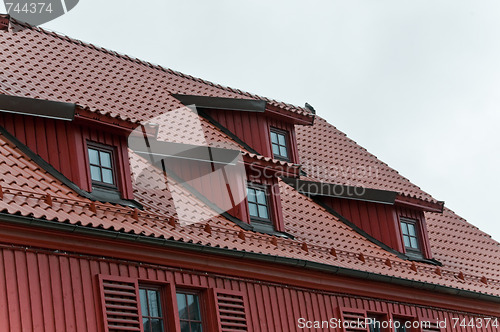 Image of Mansard with windows and tilled roof