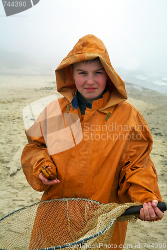 Image of Boy with fisherman's coat