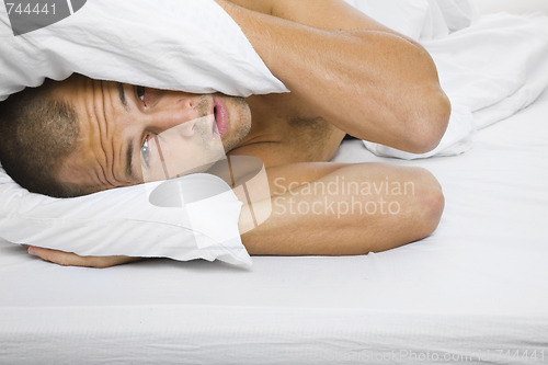 Image of Man in Bed