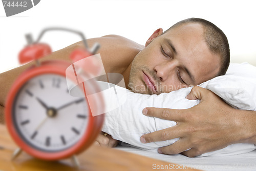 Image of Man Asleep with Clock