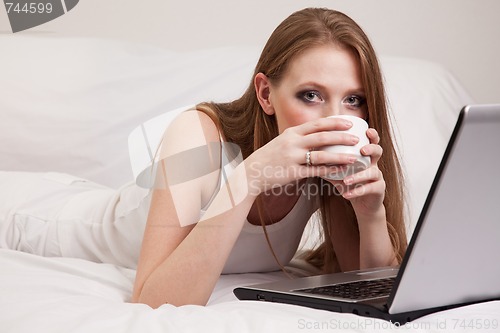 Image of Young attractive caucasian twenties lounging woman