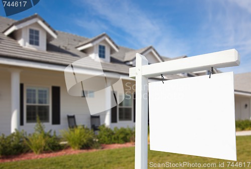 Image of Blank Real Estate Sign & Home