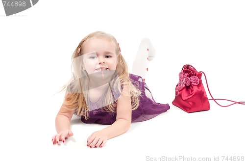 Image of Studio shot of baby girl in gala dress