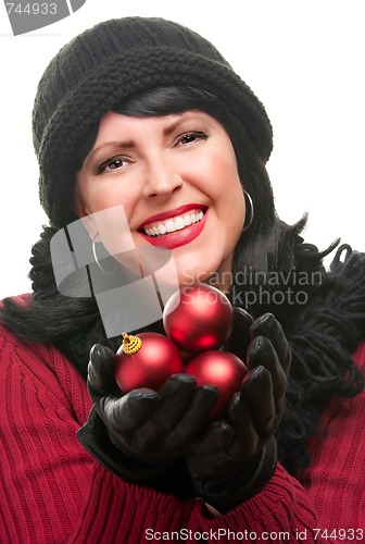 Image of Attractive Woman Holding Red Ornaments