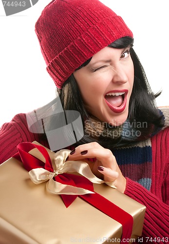 Image of Pretty Woman Holding Holiday Gift