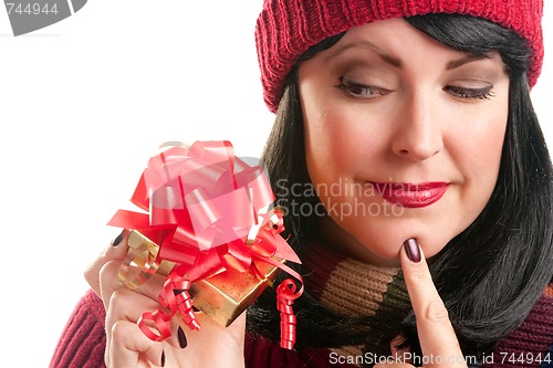 Image of Pretty Woman Holding Holiday Gift