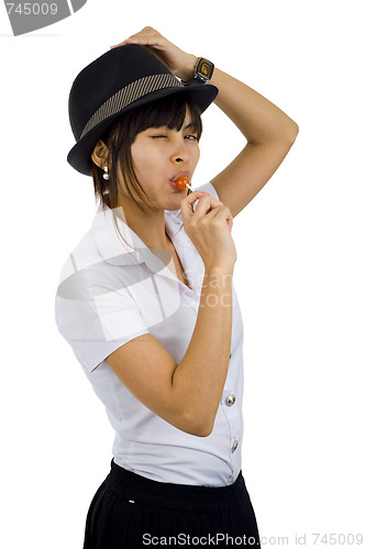 Image of student with lollipop