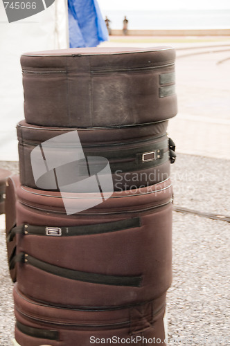 Image of carrying cases for steel pan drums roadside port of spain trinid