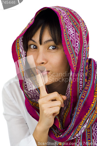 Image of  woman with finger on her lips